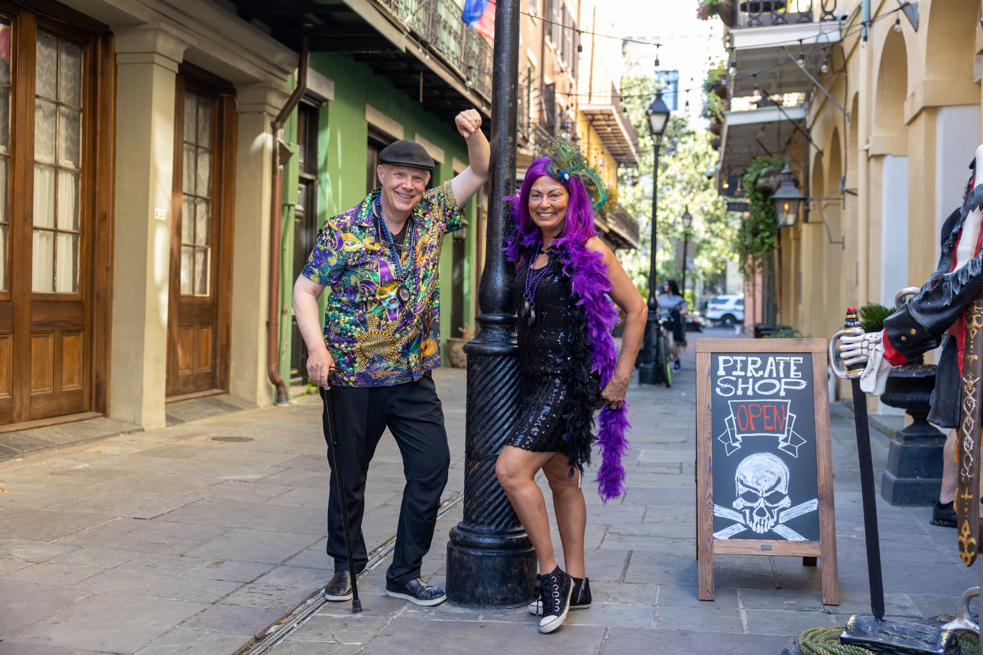 Randy and his wife posing by a lamppost in the French Quarter before the Thriver Parade